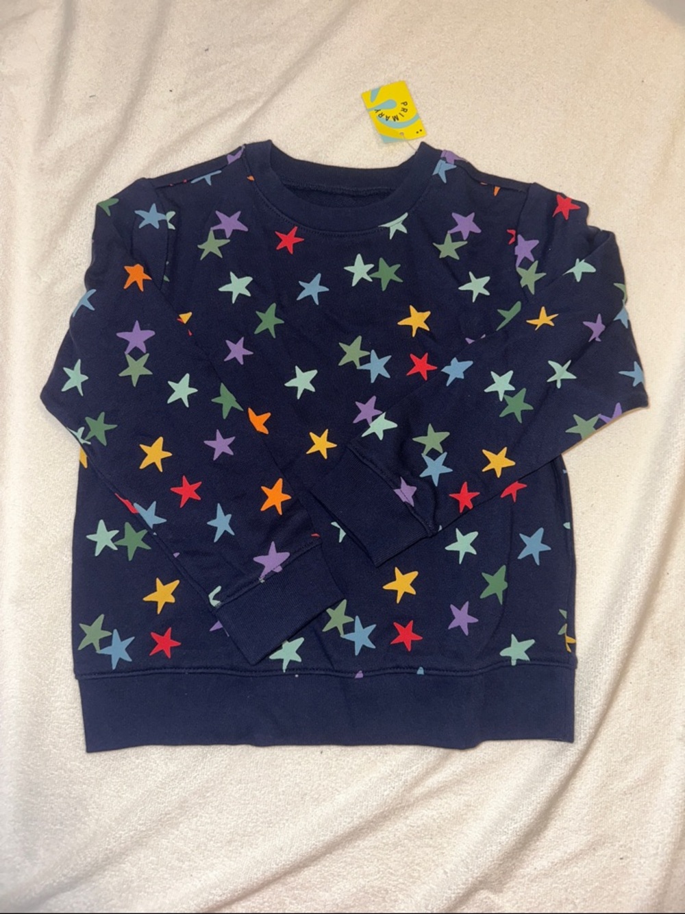 NWT Primary sweatshirt with rainbow stars - size 6-7
